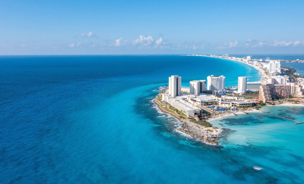 Luxury resorts follow the twisty beaches of Cancun.