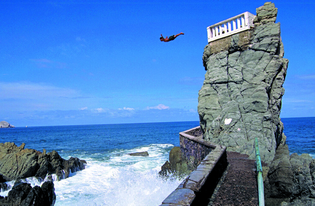 Mazatlan, Mexico cliff diver gives a performance.