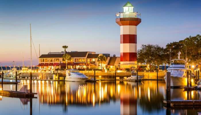 Hilton Head, South Carolina, USA lighthouse on the coast at twilight.