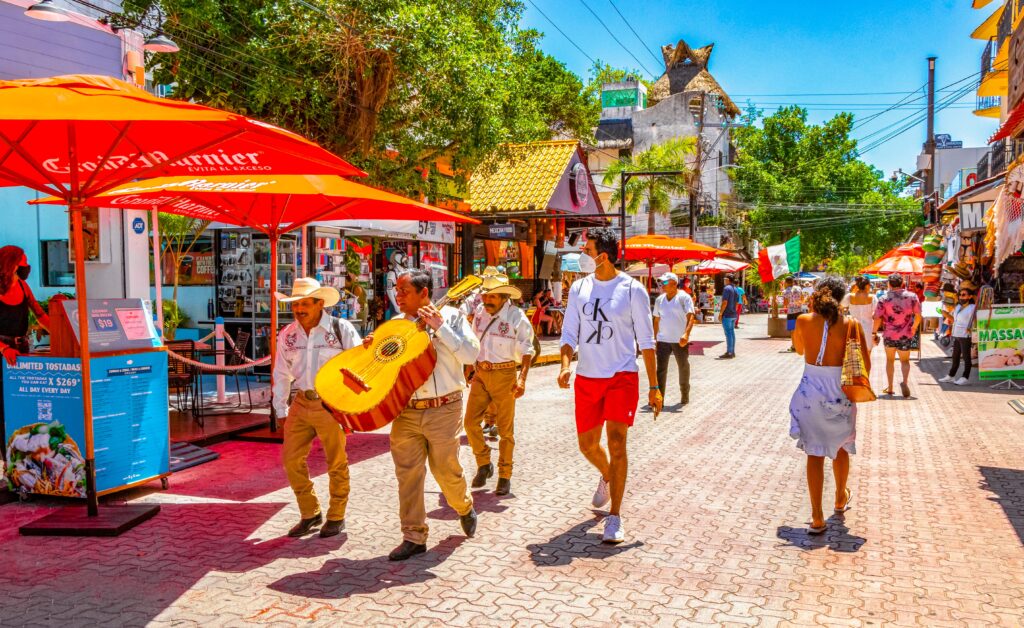 stock-photo-playa-del-carmen-march-typical-street-road-and-cityscape-of-la-quinta-avenida-with-2289447315